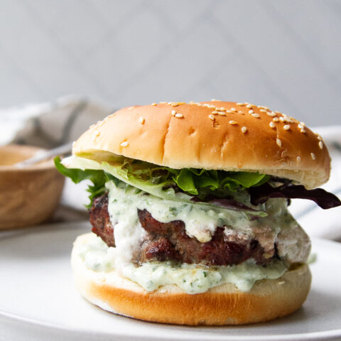 Goat Cheese-Stuffed Burger with Tangy Goat Cheese-Cucumber Dressing