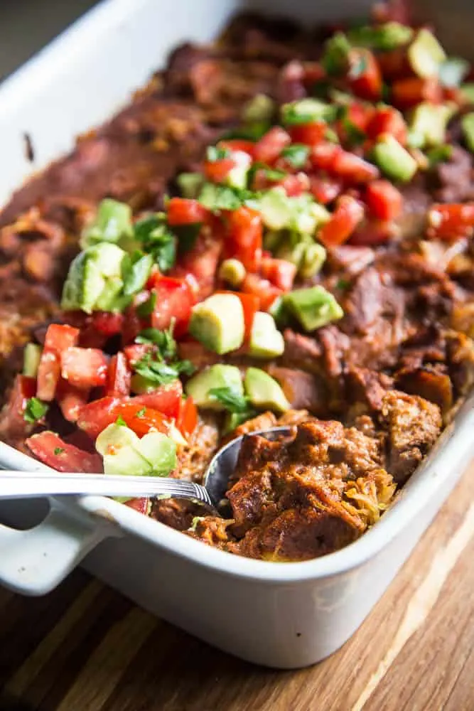 Variations on spaghetti squash bakes -- this one is a Chicken Enchilada Spaghetti Squash bake.