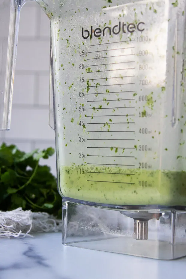 Cilantro lime vinaigrette in a blender. 