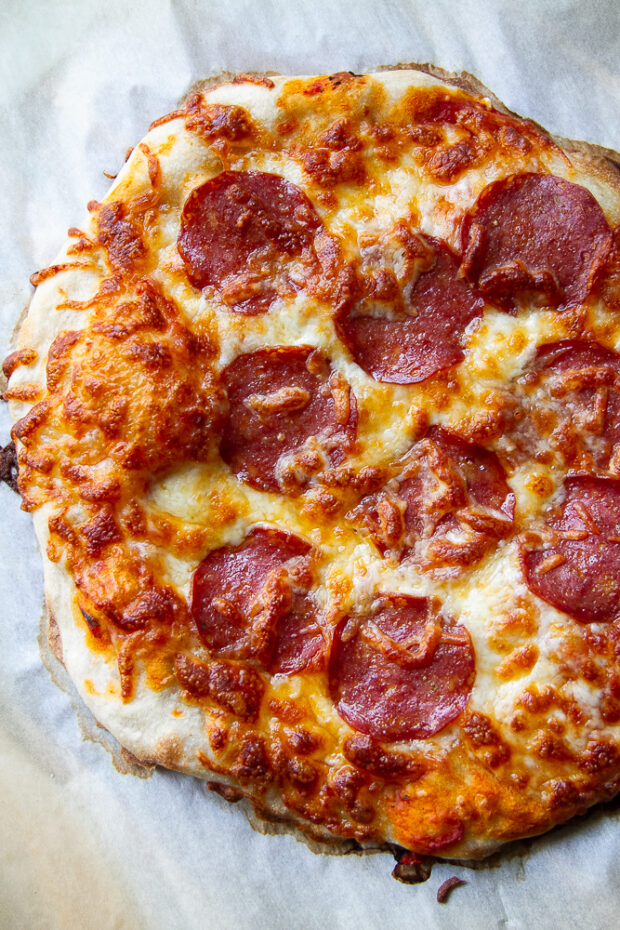 Finished pepperoni pizza on sourdough crust.