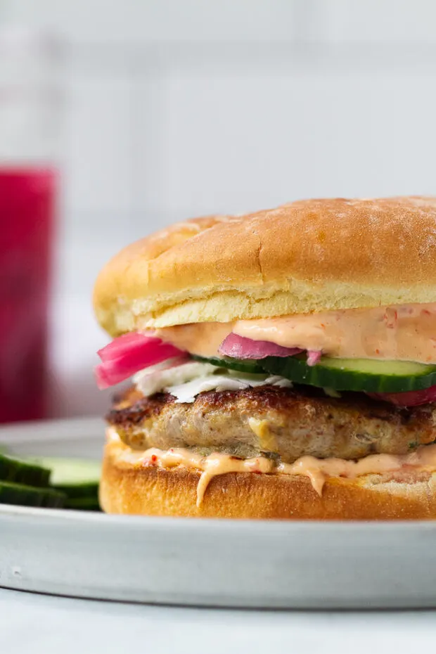 View of a finished burger -- close up from the side. 