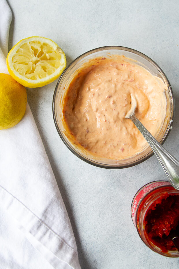 Spicy mayo mixed up in a small bowl. 