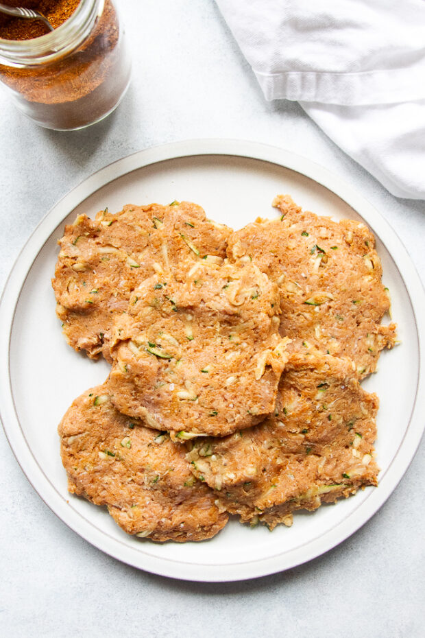 Seasoned ground turkey formed into patties.