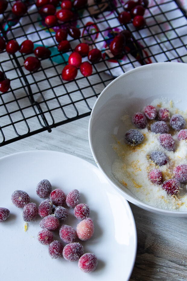 Chilled cranberries dipped in orange sugar and ready to go on top of the pie.