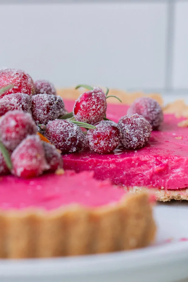 Close up of the sliced cranberry tart.