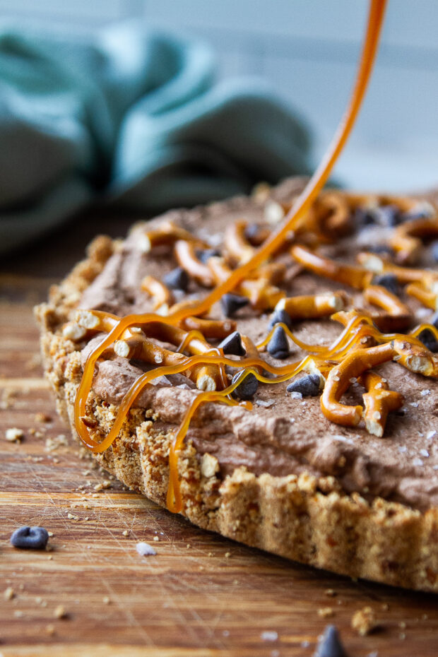 Close up of the sea salt caramel drizzled over the tart.